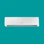 White wall mounted air conditioner unit against a teal background