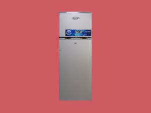 Two door KenStar refrigerator with top freezer and promotional blue label standing against a pink background