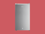 Tall stainless steel mini refrigerator with KenStar logo standing on small feet against a red background