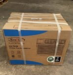 Boxed Kenstar KS T91W window air conditioner strapped for transport on a concrete floor