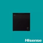 Compact black Hisense mini fridge with a control dial on a teal background