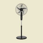 Black pedestal standing fan with a round grille on a beige background ready to cool a room