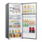 Stainless steel fridge with doors open showing organized shelves of fruits vegetables dairy beverages and frozen items on both sides