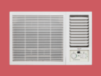 Window air conditioner unit with a large front grille on the left and a smaller louvered vent on the right mounted in a wall
