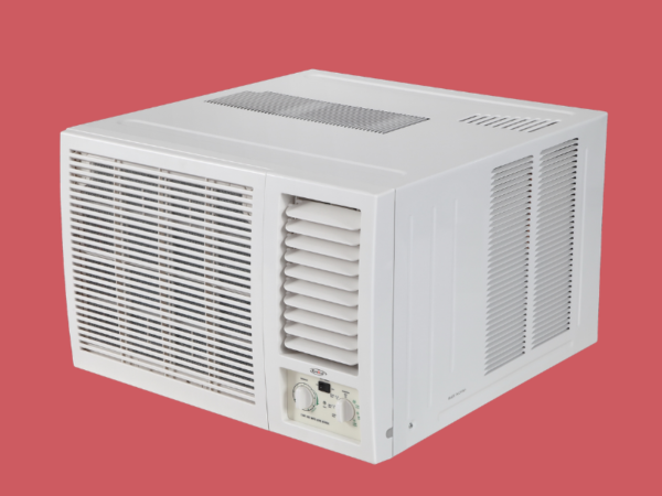 White window air conditioner with front grille and control panel against a red background