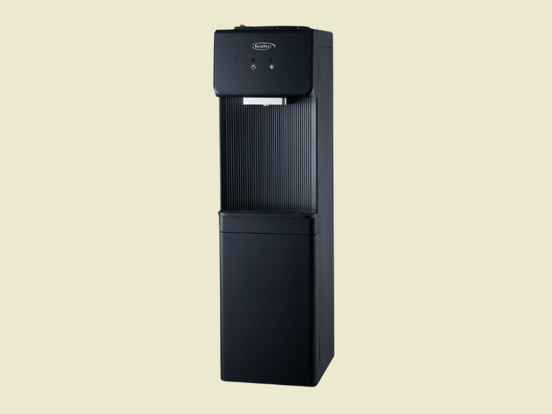 2025111011043219png | Mitos Shoppers Tall black freestanding water dispenser with hot and cold taps and a drip tray standing against a beige background