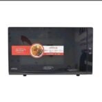 Black KenStar microwave oven with a red and white promotional label on the door