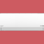 White wall mounted air conditioner unit with an inverter label set against a red background showing the front panel and vents clearly visible on the bottom edge
