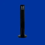 Tower style black electric fan standing upright on a blue background