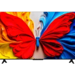Flat screen TV showing a vibrant abstract butterfly made of red yellow and blue swirls on the screen