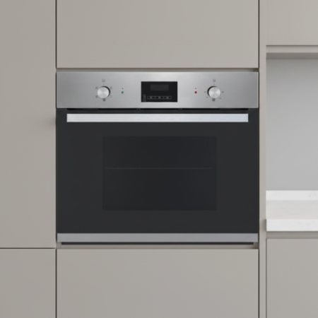 Built-in stainless steel oven set in light-gray kitchen cabinetry with a black glass door and control panel above the door