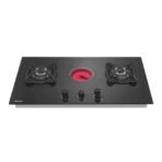 Black gas hob with two side burners and a central red lit burner three knobs in front