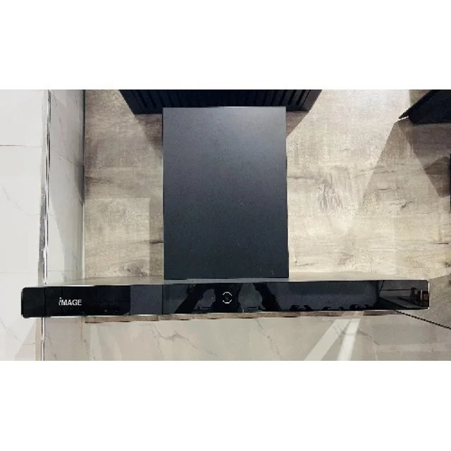 Top down view of a black glossy soundbar on a glass table with IMAGE branding visible on the left
