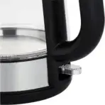 Close up of an electric kettle showing a black handle and a chrome control knob near the base