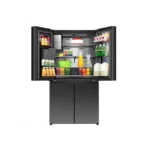 Open French door refrigerator with bottom freezer doors wide filled with milk juice produce and groceries visible inside