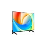Flat screen television on a black stand showing a vivid multicolored abstract wallpaper
