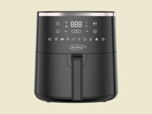 Black KenStar air fryer with digital control panel and vertical handle on a pale yellow background