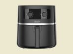 Black KenStar air fryer facing front with a large vertical handle and control panel on top set against a beige background ready to cook