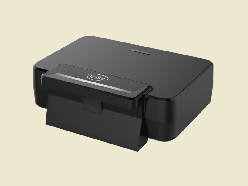 Black compact KenStar toastersandwich maker with a front slot and pull down tray plus green and red indicator lights on top