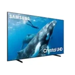 Samsung Crystal UHD TV displaying an underwater scene with a diver and a whale