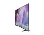 Slim flat screen TV with a colorful display shown in an angled three quarter view on a stand