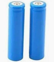 Two blue cylindrical batteries standing upright next to each other on a white background