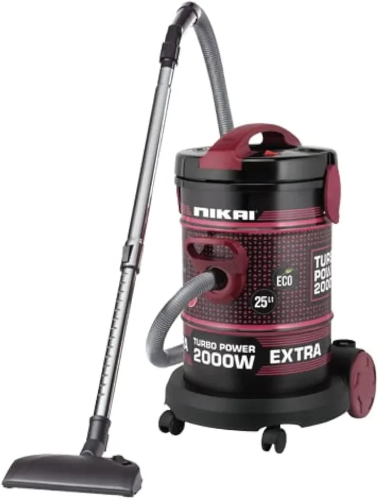 Nikai 2000W turbo canister vacuum with pink and black body and hose attachment
