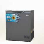 Grey chest freezer with a blue sticker reading Smart Freezing and snowflake graphics on the front against a light background