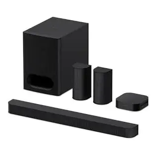 Black home theater speaker system including a subwoofer, two satellite speakers, a center speaker, and a long soundbar.