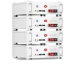 Four white ITel Energy battery modules stacked in a vertical rack showing red terminal bars and status indicators as part of an energy storage system