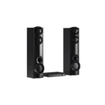 Pair of black floor standing speakers with multiple circular drivers flanking a slim black AV receiver on a light background
